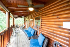 Beat the heat on the covered deck equipped with ceiling fans