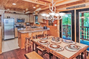 Enjoy cooking those family meals in the updated kitchen and enjoy eating them around the custom log dining table