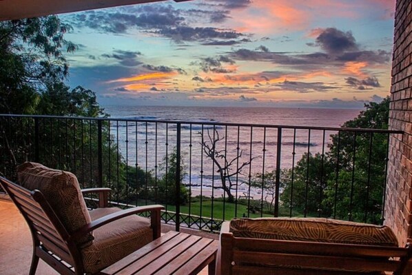 From your private balcony, watch the sky turn to amber as the sunsets. 