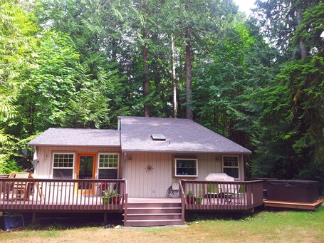 Peaceful vacation home surrounded by trees.