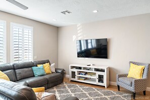 Featuring a flat screen tv.