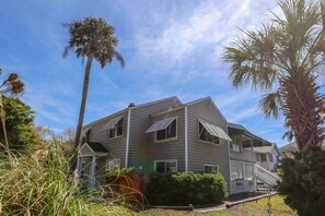 Palm Up is located on the upper level of this Isle of Palms house.