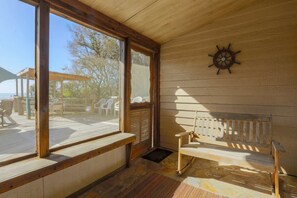 Read a book and feel the cool seabreezes in our screened-in porch.