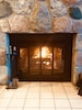 Real Split stone Fire Place with free wood just outside your door under walkway