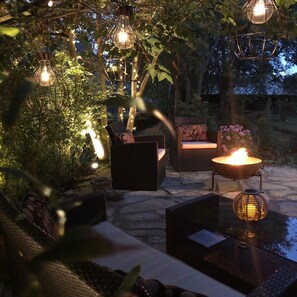 Private patio with Indian Firebowl and atmospheric lighting