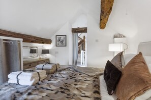 Cuddle up in the romantic double bedroom