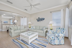 Sumptuous Seating – You and the gang will love hanging out in the blue-and-white living room, chatting, playing a game or watching a movie! (Psst…the sofa folds out into a queen-size bed, too, so there's room to sleep two more.)