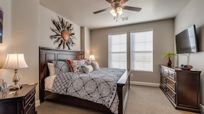 Master suite on Main level featuring a king and a flat screen tv