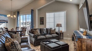 Family Room Featuring large flat screen tv