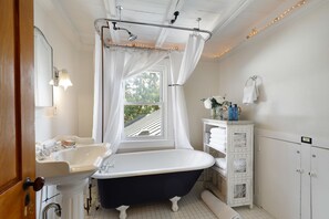 Master bedroom clawfoot soaking tub.