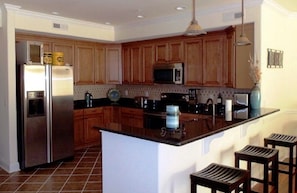 Kitchen with stainless steel Jenn-Air appliances - Unit 213