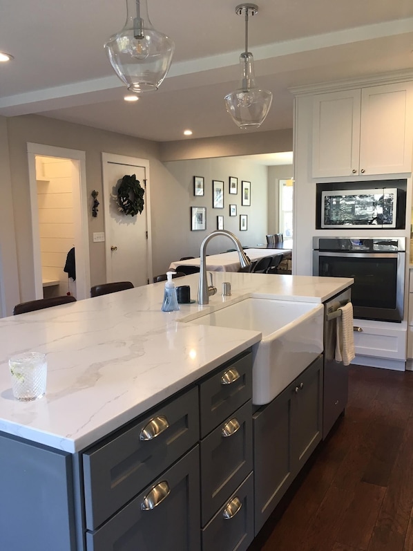 New kitchen with ship lap mud room 