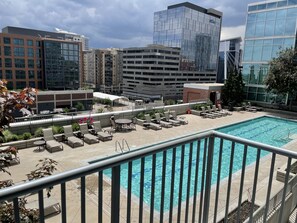 Unit with deck overlooks pool.
