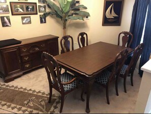 Large, expandable dining room table with buffet.