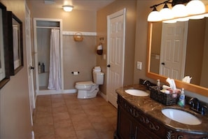 One of the three upstairs baths. This one between two rooms in Family Suite
