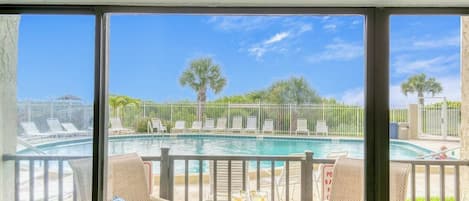 Walk right out your patio doors to the pool and beach!

Note: The patio enclosure was removed during the recent balcony restoration project. The patio is no longer gated.