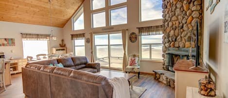 Endless ocean views and up-stated casual comfort make this living room a place you won't want to leave.