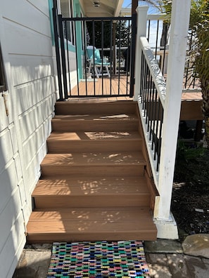 Stair up to deck. Gate protected for dogs and children.