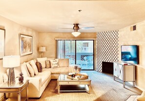 Stunning living room area with soft lighting and welcoming seating 