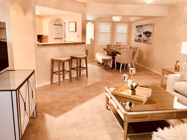 Spacious great room living plan with large screen TV. Elegant & very comfortable