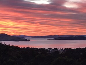 Sunrise view from the master bedroom of Bruny Island, Tinderbox and the Iron Pot