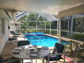 Outdoor dining with pass through window to the kitchen