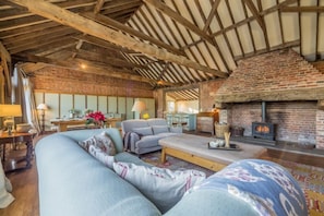 Ground floor: Large seating area with wood burning stove as the centre piece to the room