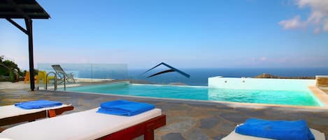 The large terrace with the swimming pool and fantastic sea view