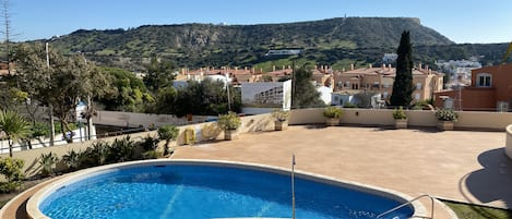 View from the balcony of the shared pool terrace and the scenery beyond.