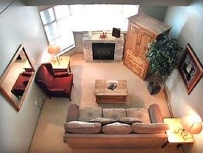 View of the Living Room and Gas Fireplace from the Loft