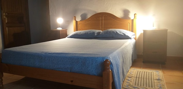 cosy bedroom with wooden beams.