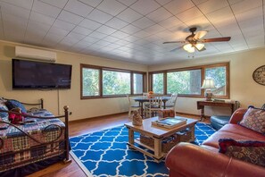 Enjoy your morning coffee by the large windows overlooking the lake