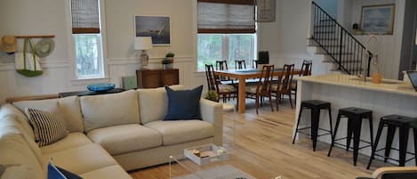 Open concept living room, dining room and kitchen.