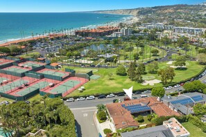 Across the street from the Golf Course.one block walk to shores beach access