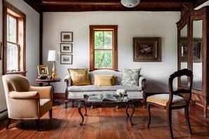 sunny antique filled living room