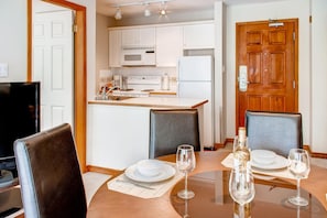 Dining area and fully equipped kitchen