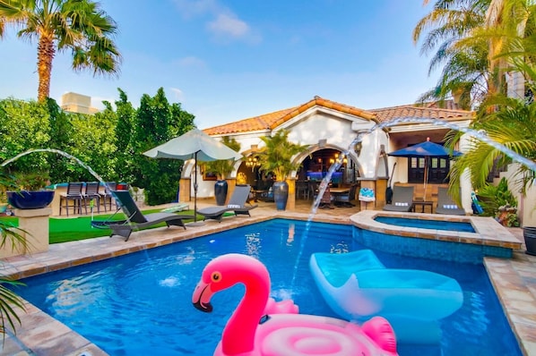 Enjoy poolside paradise with floaty toys, ensuring endless fun under the San Diego sun at Casa Paradiso.