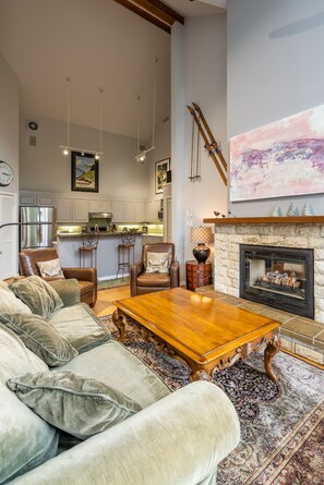 Living room, dining table and kitchen  all in one open space