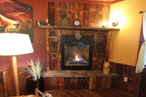 Living room with cozy fireplace.