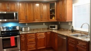 Enjoy A Fully Stocked State of the Art Kitchen