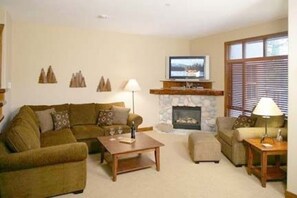 Living Room with 42" Plasma TV and DVD Player.