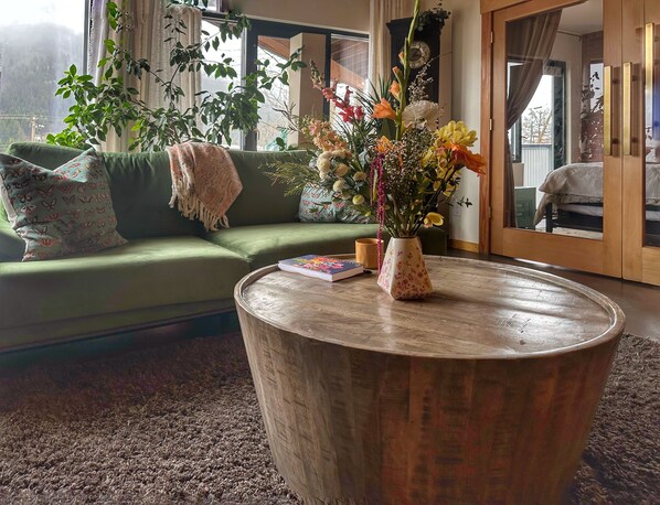 Large windows, lovely velvet couch