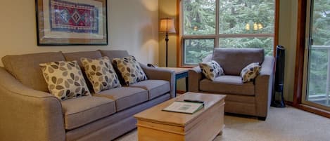 Living room with sofabed and gas fireplace