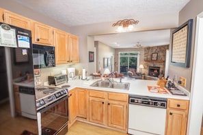 Kitchen Opens to the Living Room and Dining Table