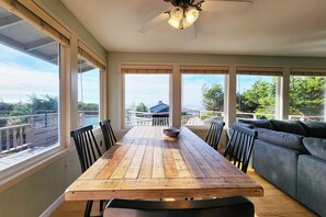 Enjoy family meals at this large dining table.