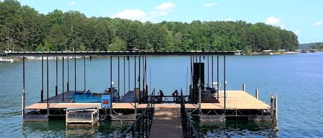 Extra large private dock with party area. DEEP water all year. Great lake views.