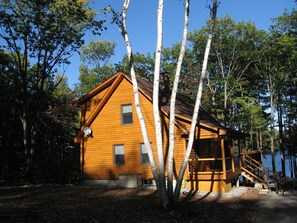 Log cabin from driveway