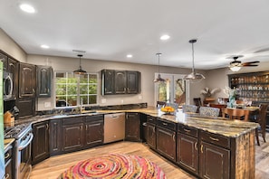 Kitchen and dining room
Cabinets are “distressed wood”