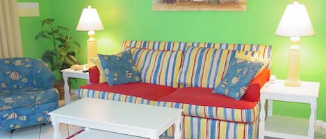 We would be delighted to share our colorful beach condo with you.