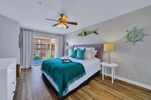 Primary Bedroom With King Bed and Balcony